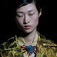 A model wears a creation as part of Dries Van Noten Spring-Summer 2018 ready-to-wear fashion collection presented Wednesday, Sept. 27, 2017 in Paris. (AP Photo/Francois Mori)